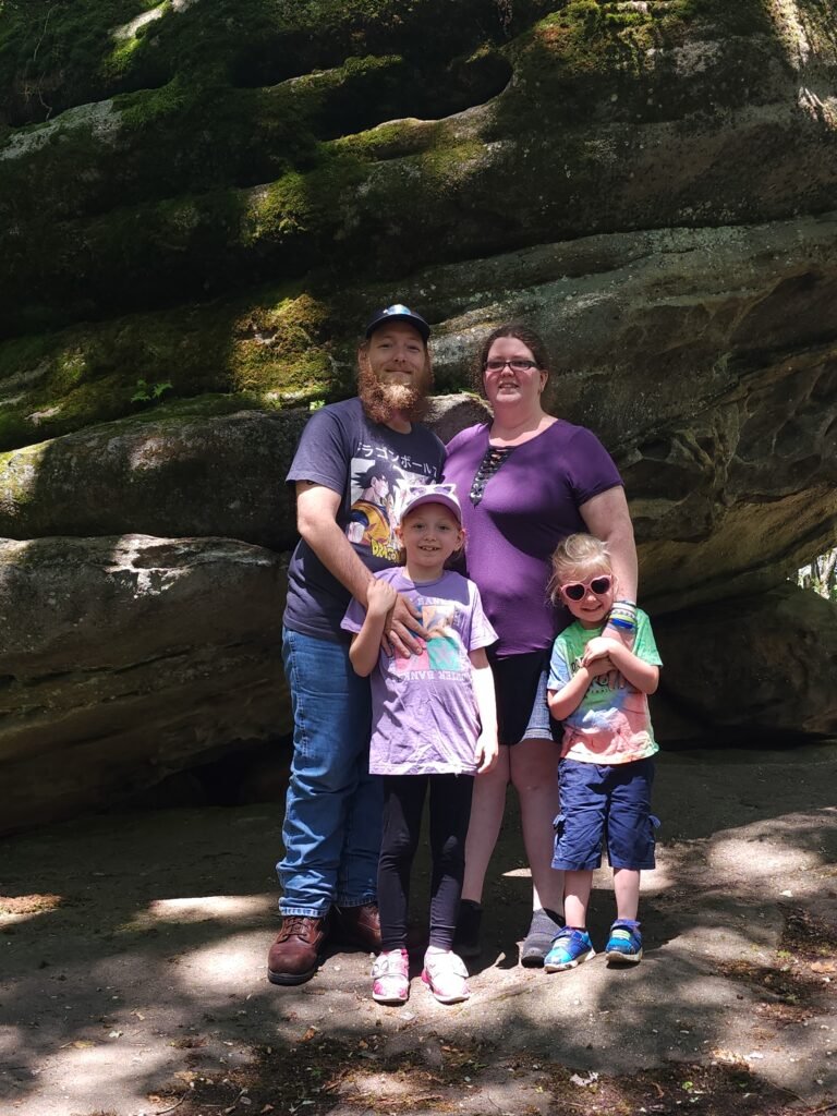 Cristifer Hanmore with his family on a hike in New York